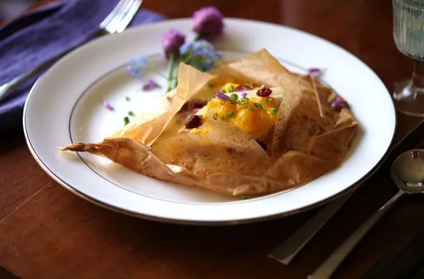 Lachs en Papillote mit Mangos und Orangen-Suprêmes